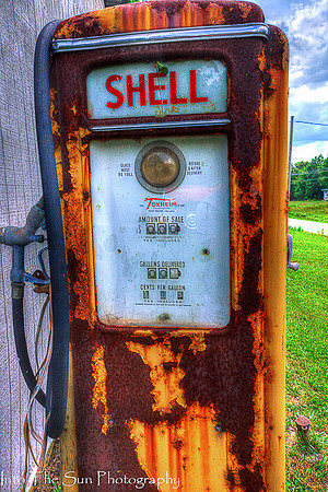 rusty old Shell gas pump